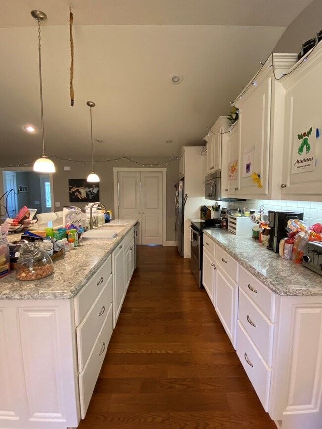 Photo - FENCED BACKYARD! BONUS ROOM/OFFICE! SAFE ROOM! THREE CAR GARAGE