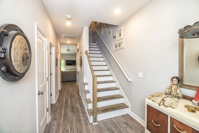 Photo - This spacious 3-bedroom, 2-bathroom townhouse offers modern living