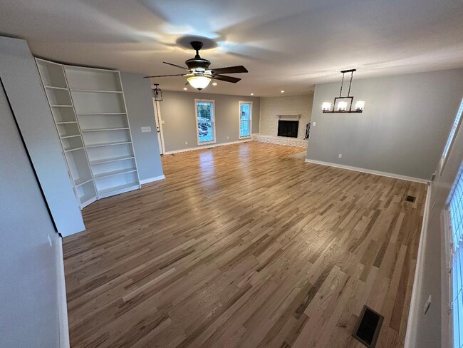 Back Living, Dining & View of Front Living area with Fireplace - 4737 E Circle Dr NW