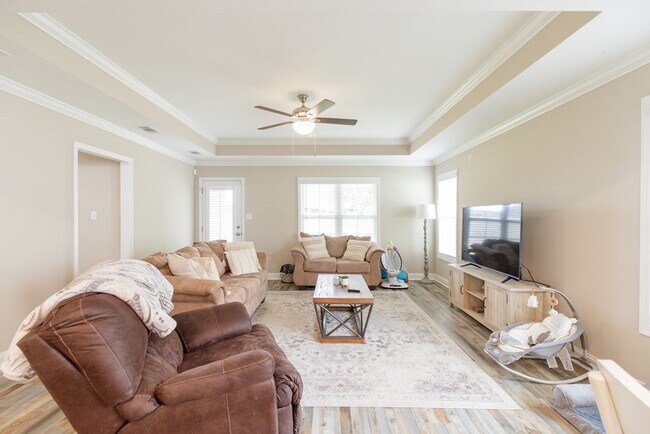 Photo - Contemporary 4BR/2BA Home with 2-Car Garage, Spacious Yard, and Close Proximity to Moody Air Forc...