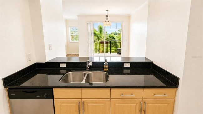 Photo - 1064 N Tamiami Trl Unit 1325