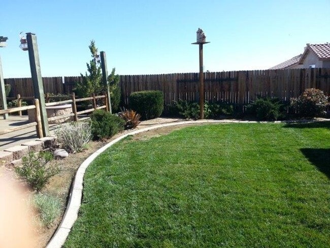 Photo - spacious 3 bedroom 2 bath home with beautiful yard, jacuzzi, indoor laundry room