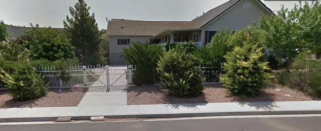 Private gated drive to apartment and carport - 835 Royal Septor Way