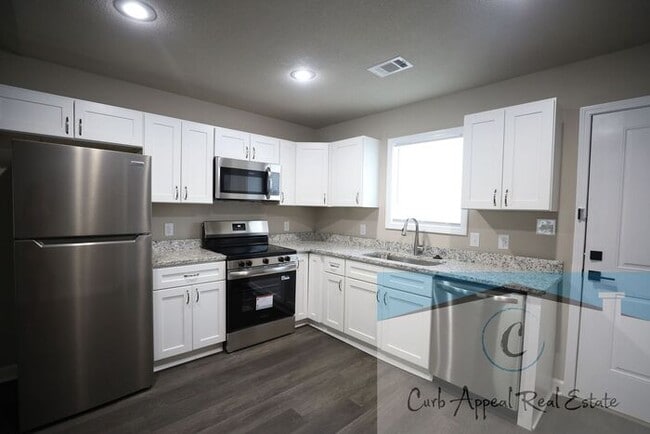 Photo - Luxury 2 bed 1 bath apartment - brand new construction!! Washer, dryer, and utilities included!!