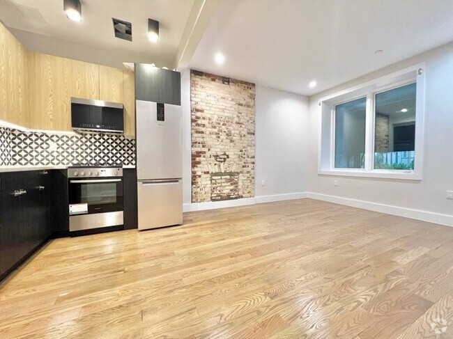 Building Photo - 1478 72nd St Unit 4 Rental