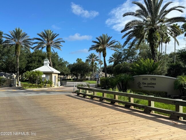 Building Photo - 1701 The Greens Way Unit 214