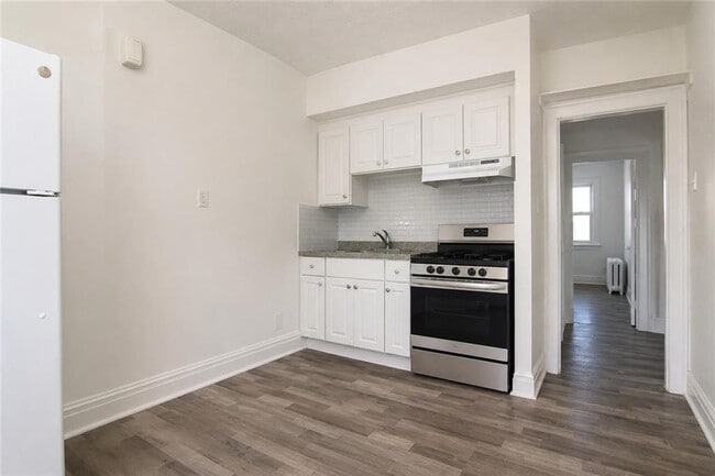 Building Photo - 6216 19th Ave Unit 2