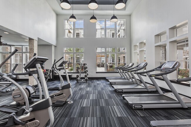Fully-Equipped Fitness Center with Highly-Specialized Technogym Cardio Machines, Free Weights, Spin Bikes, and Individual Strength Training Machines