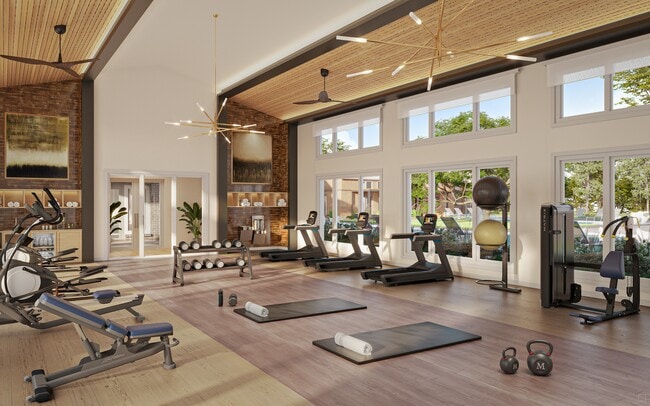 Club-quality fitness studio with cardio room and spin bikes. - Modera McKinney Ridge Apartments