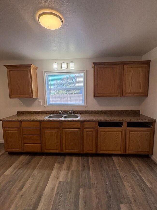 Photo - Spacious 3 Bedroom + Office | Updated Flooring | Bright & Inviting