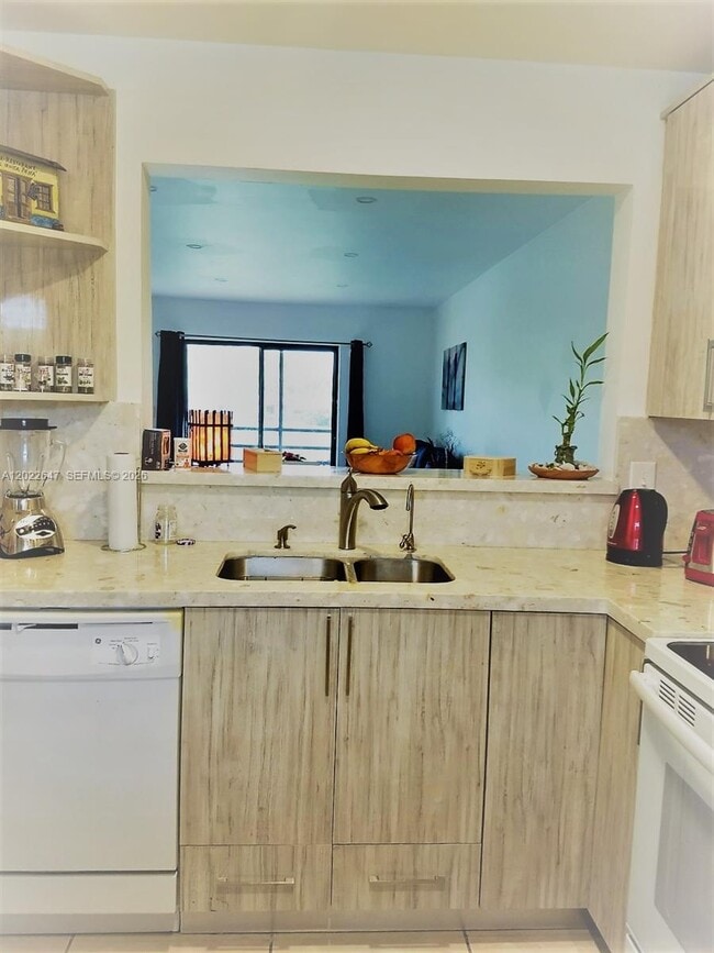 Building Photo - 14857 SW 104th St Unit 9-201