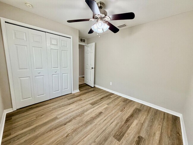 Photo - Charming 3BR/2BA Lehigh Acres Duplex with 1-Car Garage | Lawn Care & Salt Service Included