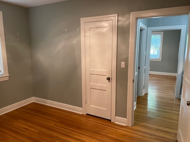 Bedroom looking into hallway and kitchen - 323 Bowwood Dr