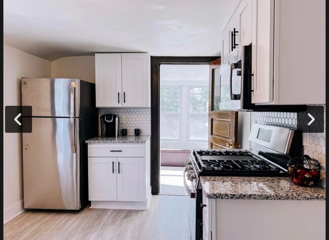 Building Photo - 1274 N 71st St Unit A