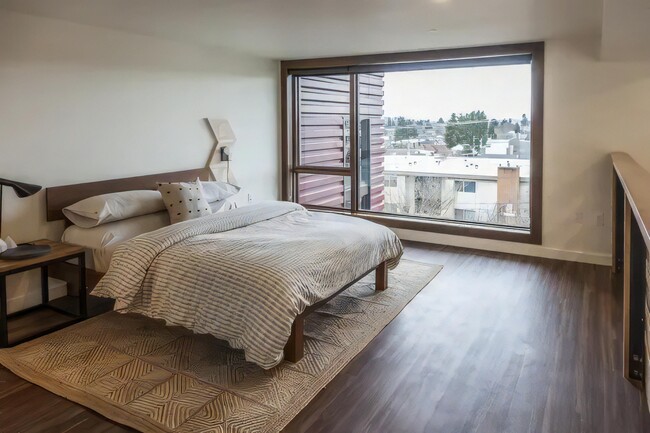 That window frames the rooftops opposite like a picture on the wall.