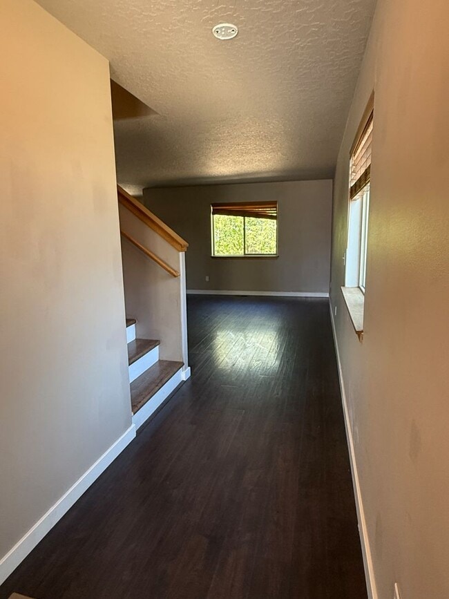 Photo - 3BR/2.5BA Home w/ Garage, Fenced Yard – Walk to Shops & Parkra