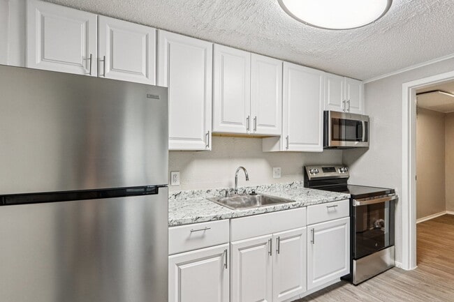 Building Photo - Summer Glen ~ Boutique Cottage Style Living Meets Hassle Free Leasing