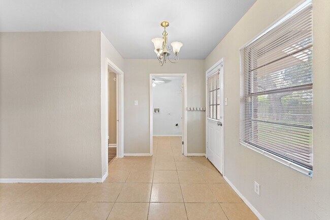 Photo - Beautifully remodeled 4 bedroom bath and a half with ceramic tile through out and laminate floori...