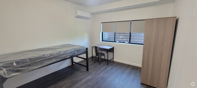 Building Photo - Single Bed Available Newly Renovated Build... Unit D - Room 2 Rental