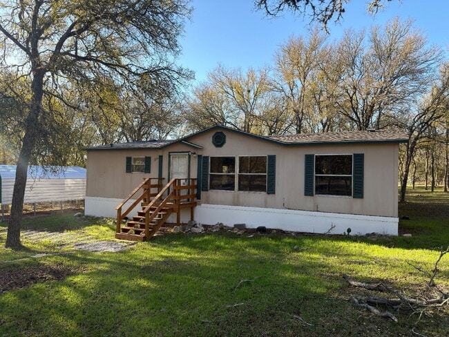 Photo - 3 bed 2 bath on one acre lot. New vinyl flooring throughout.
