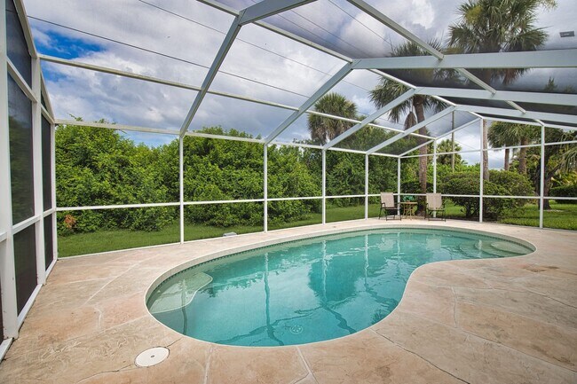 Photo - Seasonal Short-Term 2 Bed 2 Bath Heated Pool Villa with a Den in Harrington Lakes at Planation Go...