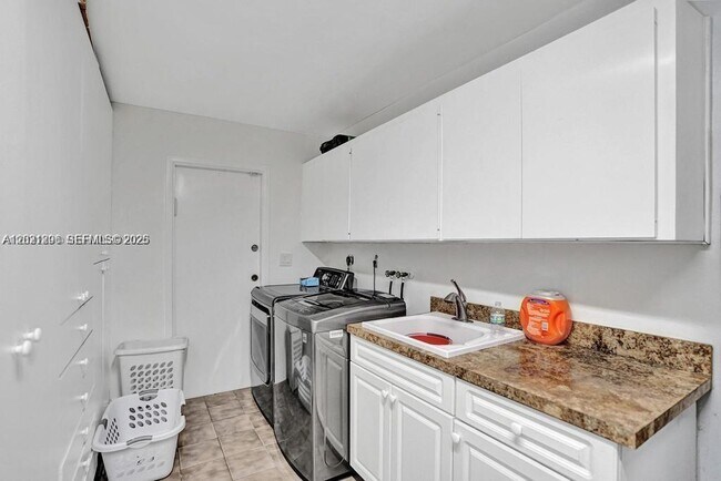 Photo - Northeast 214th Street, North Miami Beach, FL 33179 - 5 BR 4 BA single-family home