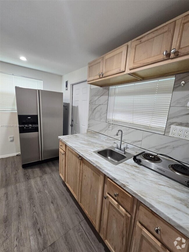Building Photo - 2521 NW 32nd St Unit A Rental