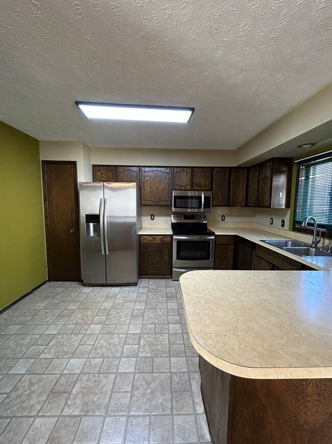 Photo - Spacious 3-Bedroom, 1-Bath Home with Garage & Basement in La Vista