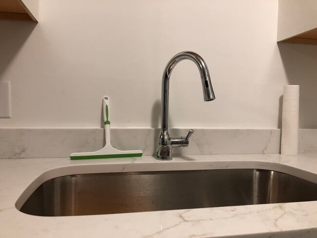 Updated kitchen sink with new faucet and counter. - 261 Simpson Ave Unit 226