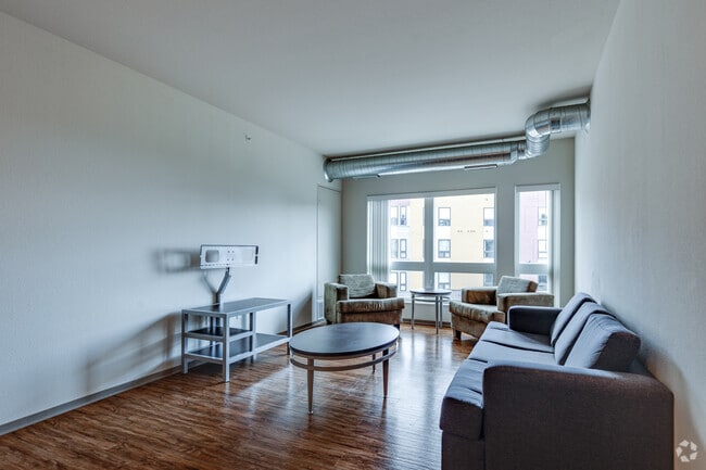 4BR, 4BA - 1,500SF - Living Room - BlueStone Lofts