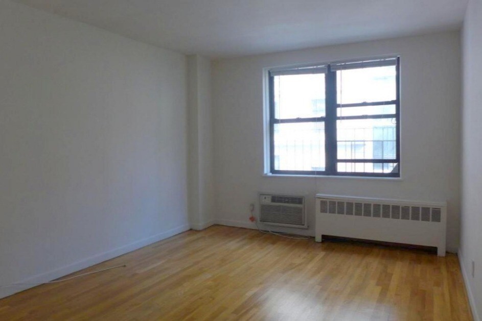 Photo - 104 E 31st St Apartment