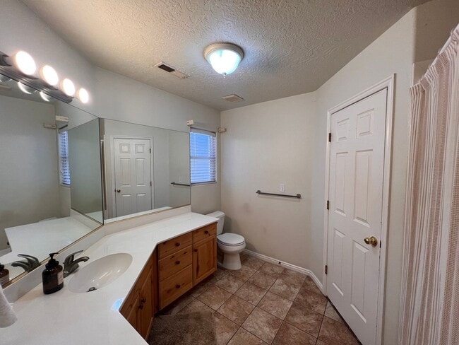 Photo - Charming 3-Bedroom Home with Spacious Layout