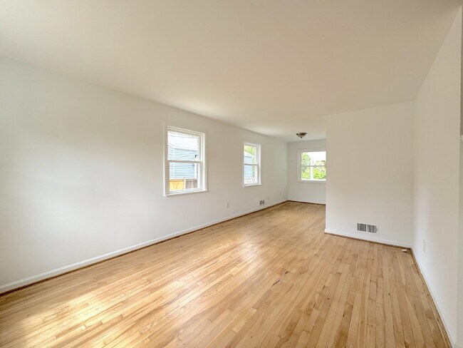Charming 2BR Townhome with Finished Basement, Fenced Yard & Private Driveway Near Huntington Metro