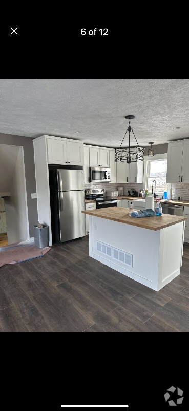 Building Photo - 7411 Pine Island Dr NE Rental