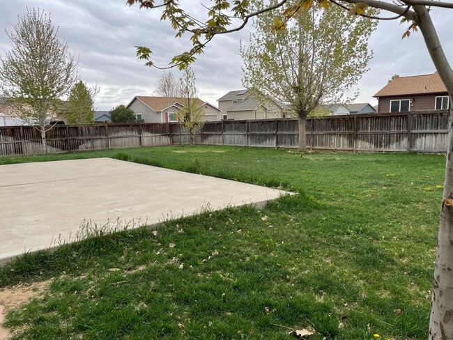 Photo - Beautiful 3 Bed 2.5 Bath Home in Milliken, Huge Corner Lot, Fenced Yard & Unfinished Basement