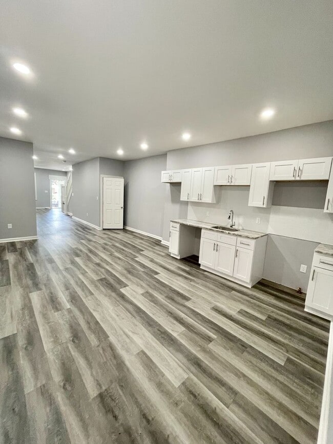 Photo - Move-In Ready 4BR Home with Bright Interiors & Ample Storage