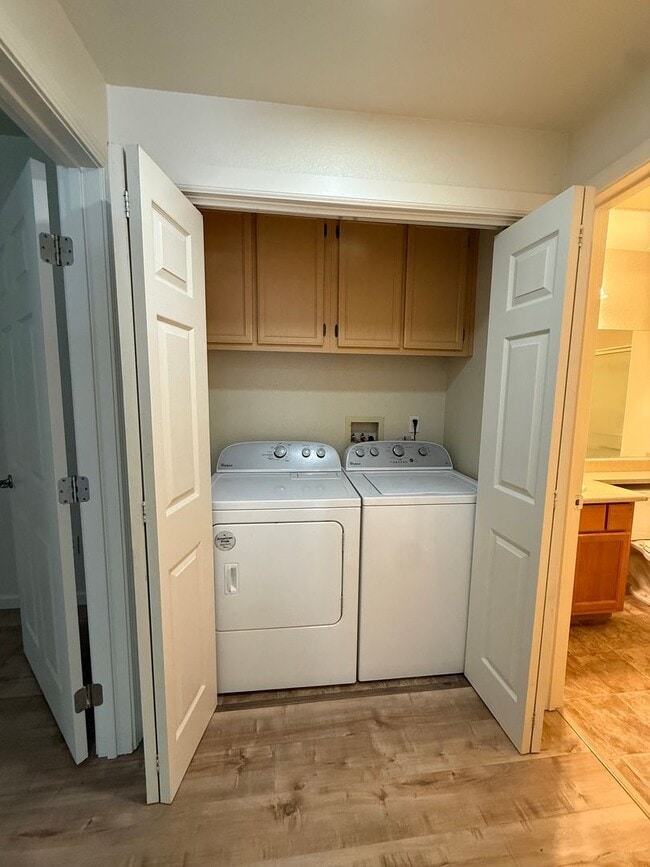 Photo - 2 bed | 2bath | 1039 SF | Private Garage | Assigned Parking | Owners pays for WS&G!