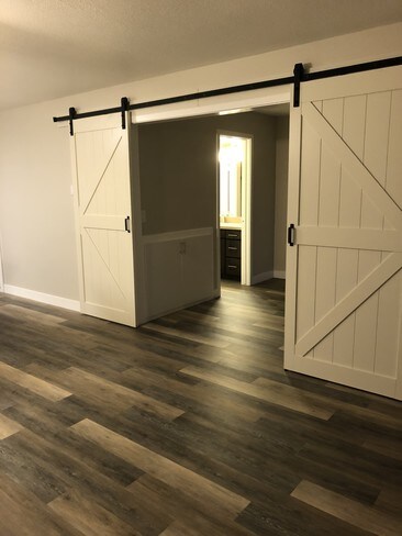 remodeled unit/living/bedroom - Apricot Pit Apartments