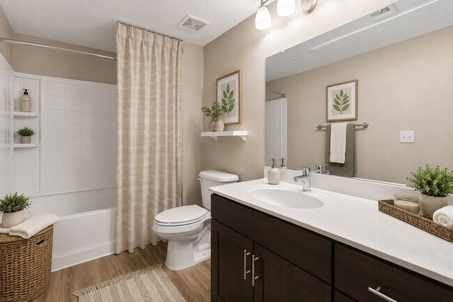 Step into modern elegance at Highland Groves at Morrison Ranch. This stylish bathroom features luxurious finishes, ample storage, and a soothing color palette for a tranquil retreat. Your perfect oasis awaits—schedule a tour today!