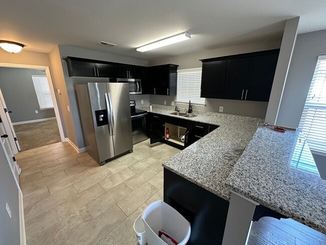 Photo - FOR LEASE - 3 bed, 2 bath, 1,128 sqft single family home!