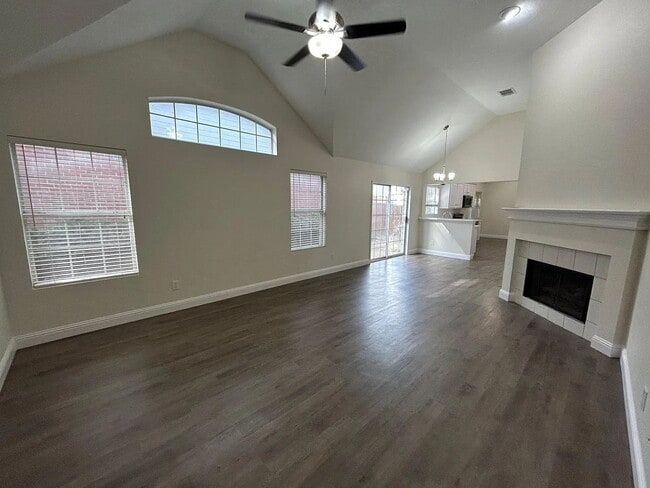 Photo - Charming 3-Bedroom Plano Retreat with Cozy Fireplace & Gleaming Hardwood Floors!