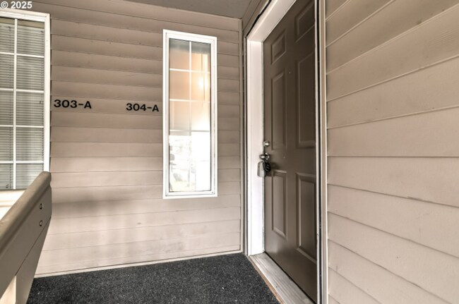 Photo - Updated Upper-Level Condo with Gas Firepla...