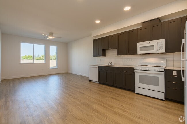 3BR, 2BA - 1092SF - Living room - Pleasant Grove Apartments