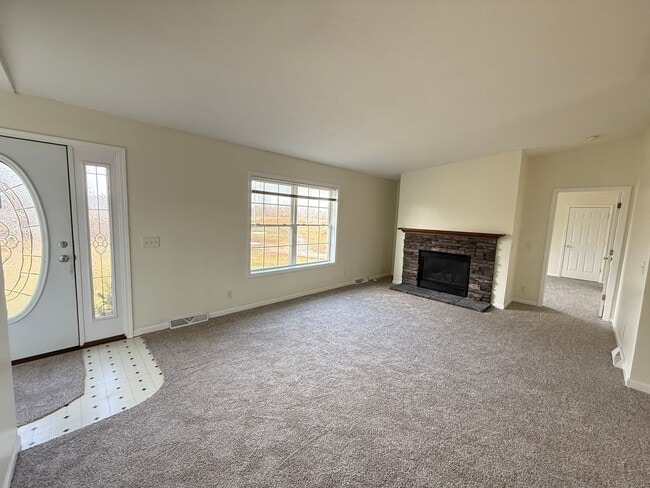 Photo - Spacious 3-Bedroom Home with Sunroom and Attached 2-Car Garage in Manchester, MI