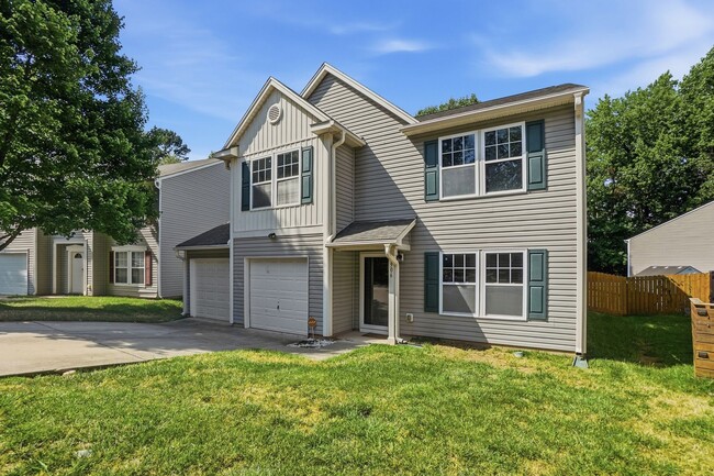 Photo - Spacious 4BR Home with New Carpet & Fenced Backyard