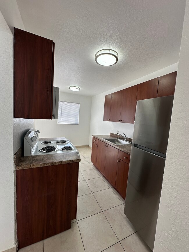 Building Photo - 16120 NE 19th Pl Unit 1