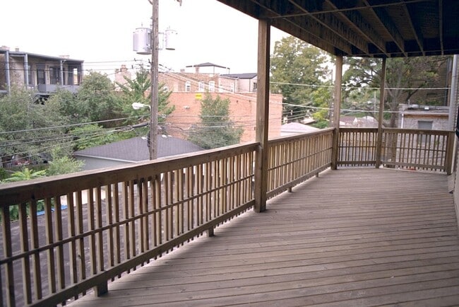 Photo - Lakeview Gem: 2 Bed, 1 Bath W/ In-Unit Laundry, D/W, Cent Air, Fireplace, Deck, Parking! Unit 1417-1