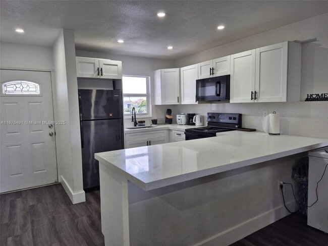 Building Photo - 6850 W 16th Dr Unit 320 Rental