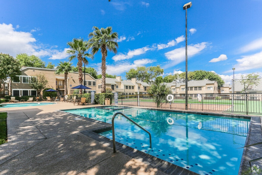 Pool and tennis court with sand volleyball