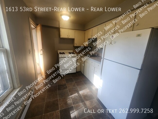 Building Photo - 1613 53rd St Unit Rear Lower